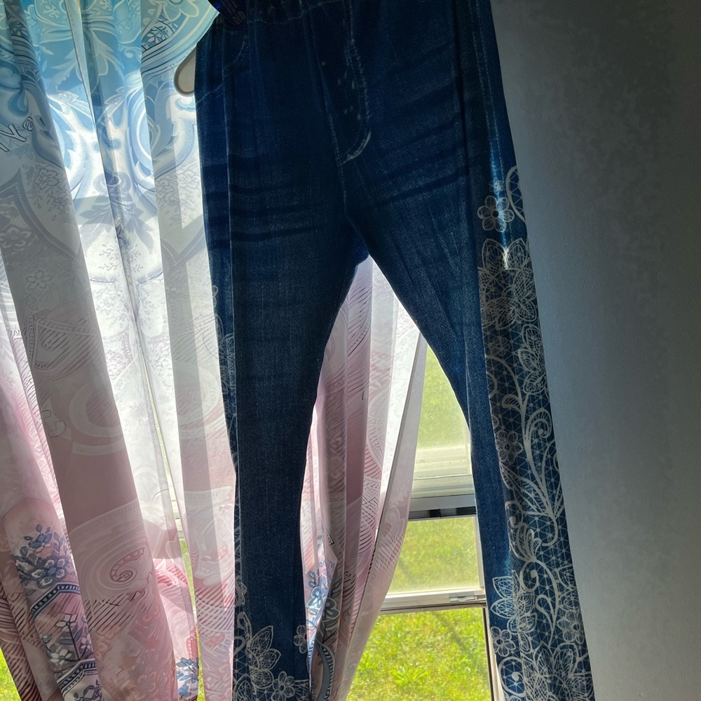 Women's Blue Jeans with White Floral Design